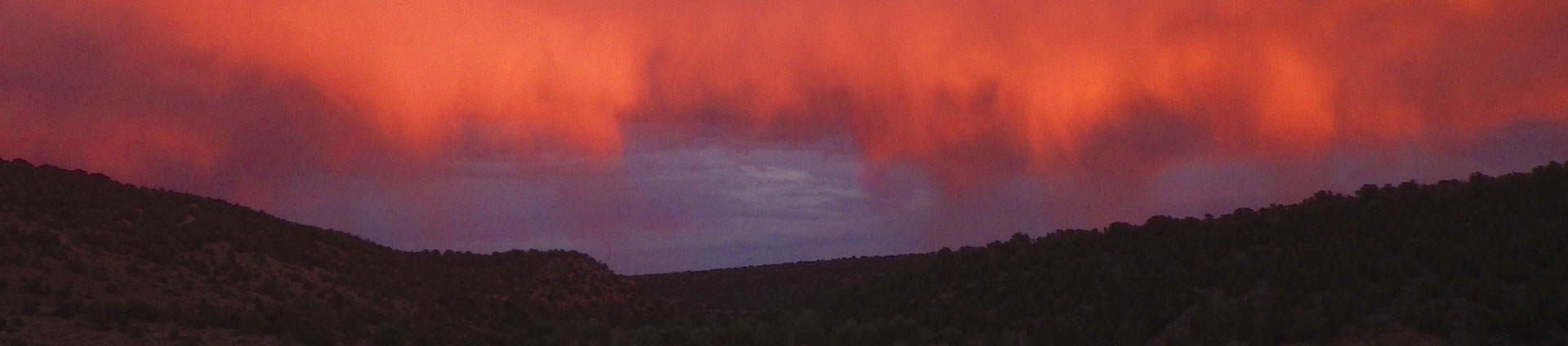 imagen de cabecera de nubes rojas y naranjas